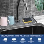 Grey BFONS silicone faucet handle drip catcher and drying tray mat with spaces for sponge and soap, placed on a kitchen count