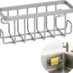 Silver rustproof aluminum sink caddy with two side hooks, holding a sponge and a brush, attached to a stainless steel sink.