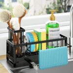 Black stainless steel self-draining sink caddy with compartments for sponges, brushes, and a hanging dishcloth.