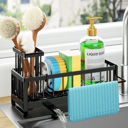 Black stainless steel self-draining sink caddy with compartments for sponges, brushes, and a hanging dishcloth.