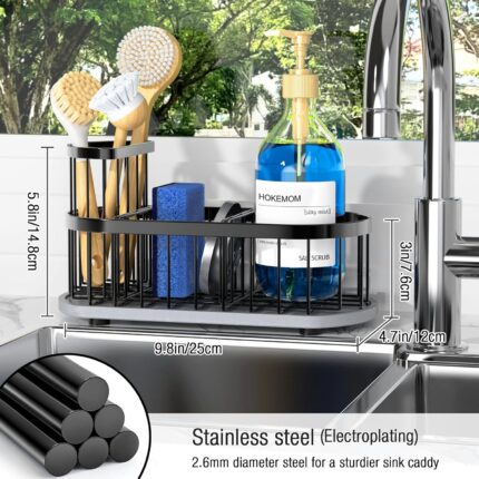 Black HOKEMOM sink caddy with quick-dry stone mat, holding sponges, brushes, and soap bottle on a kitchen countertop.