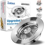 Close-up of a silver stainless steel kitchen sink drain strainer with the bounce core in open position.