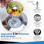 Close-up of a silver stainless steel kitchen sink drain strainer with the bounce core in open position.