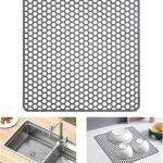 A gray Myirxcv 13.58 inch square silicone sink protector mat with raised nodules, shown unfolded in a kitchen sink.