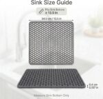 A gray Myirxcv 13.58 inch square silicone sink protector mat with raised nodules, shown unfolded in a kitchen sink.