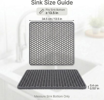 A gray Myirxcv 13.58 inch square silicone sink protector mat with raised nodules, shown unfolded in a kitchen sink.