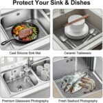 A gray Myirxcv 13.58 inch square silicone sink protector mat with raised nodules, shown unfolded in a kitchen sink.