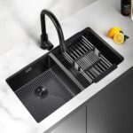 A gray Myirxcv 13.58 inch square silicone sink protector mat with raised nodules, shown unfolded in a kitchen sink.