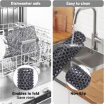 A gray Myirxcv 13.58 inch square silicone sink protector mat with raised nodules, shown unfolded in a kitchen sink.