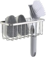 SunnyPoint NeverRust Deluxe Stainless Steel Sink Sponge Holder with an adhesive mount, shown in a clean kitchen sink.