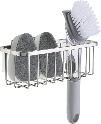 SunnyPoint NeverRust Deluxe Stainless Steel Sink Sponge Holder with an adhesive mount, shown in a clean kitchen sink.