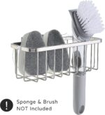 SunnyPoint NeverRust Deluxe Stainless Steel Sink Sponge Holder with an adhesive mount, shown in a clean kitchen sink.